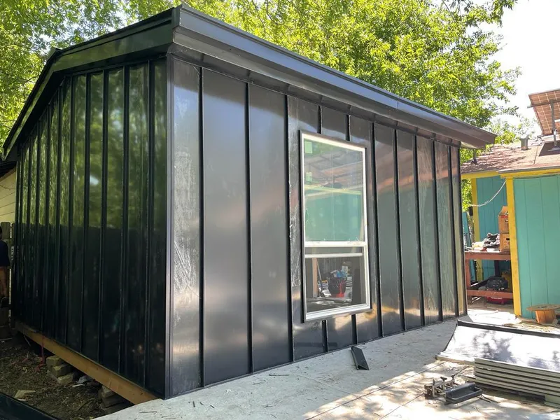 Black standing seam metal wall panels for Metal Roof Installation in Old Forge
