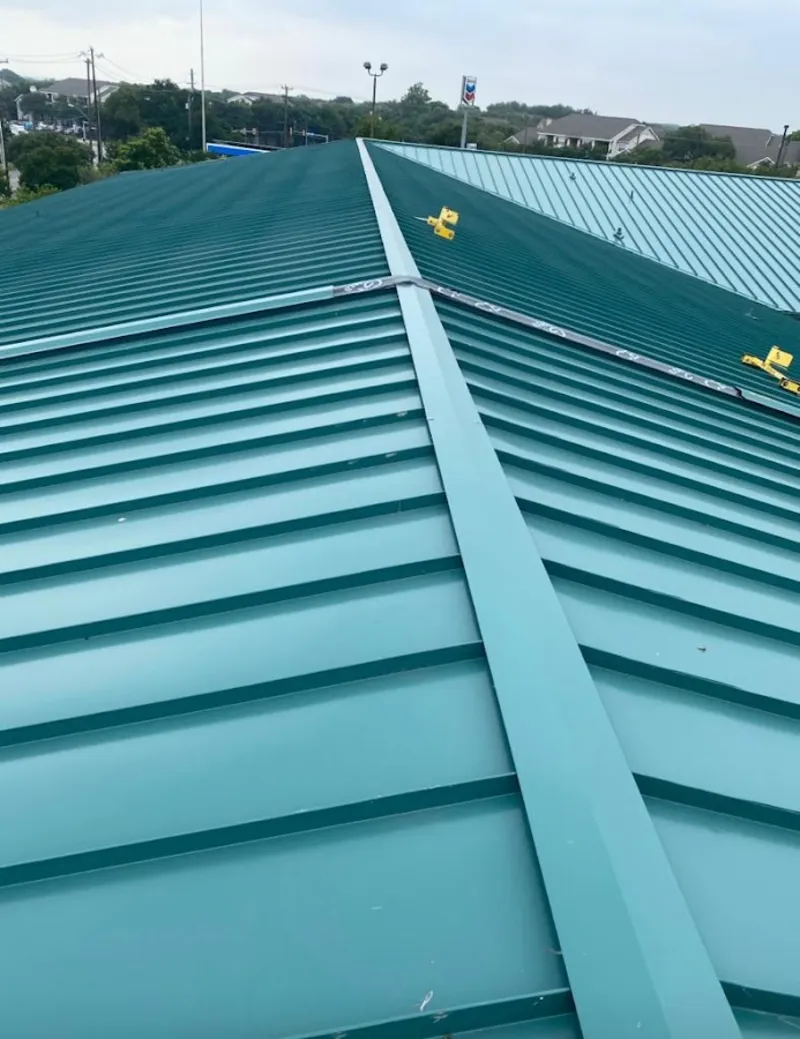 Green commercial metal roof ridge and valley for Metal Roof Repair in Old Forge