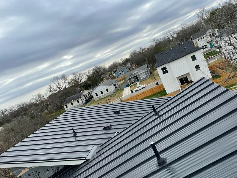 Standing seam metal roof panels with vents for Skylight Repair in Old Forge